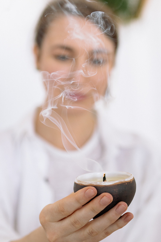 A Person Holding a Candle