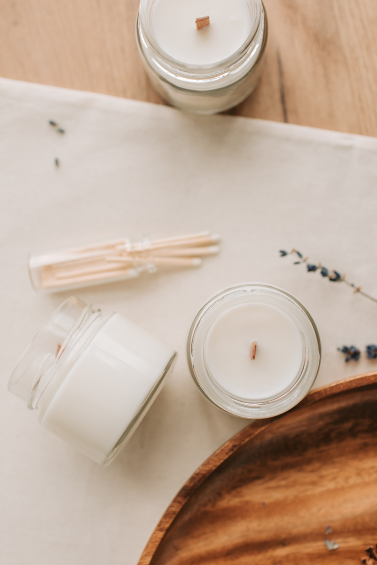 White Candles in the Glass Jars 