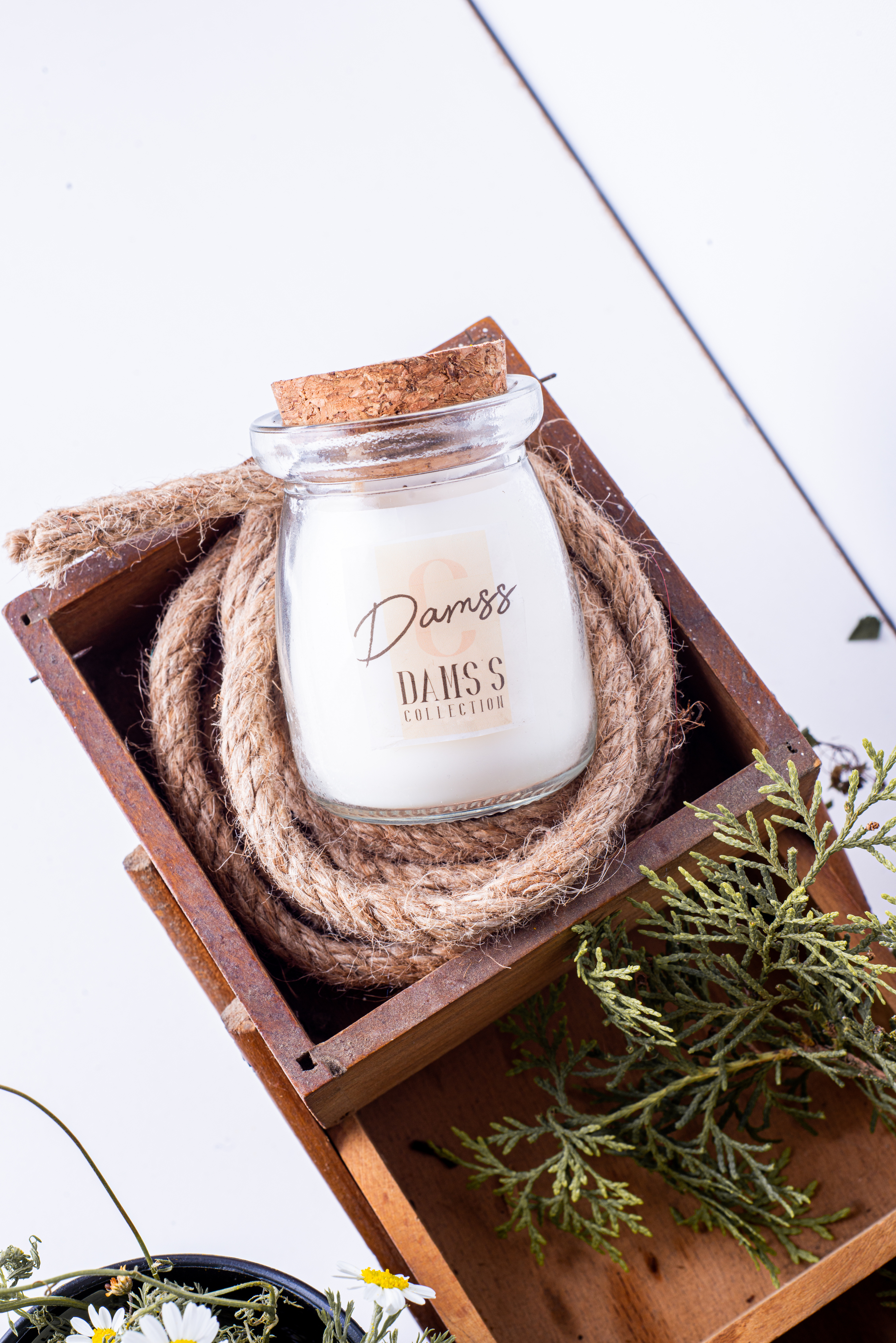 A Candle, Rope and a Twig in a Wooden Box 
